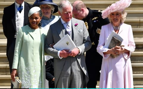 Prince Charles escorts Doria Ragland from St George's Chapel after her daughter Meghan's wedding to Prince Harry - Credit: Getty Images Europe/WPA Pool