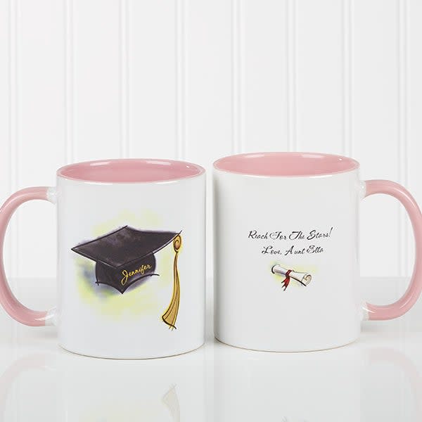 <p><a href="https://go.redirectingat.com?id=74968X1596630&url=https%3A%2F%2Fwww.personalizationmall.com%2FCap-Diploma-Personalized-Graduation-Coffee-Mug-Pink-i50368.item%3Fproductid%3D8584&sref=https%3A%2F%2Fwww.womansday.com%2Frelationships%2Ffamily-friends%2Fg36467619%2Fbest-college-graduation-gifts%2F" rel="nofollow noopener" target="_blank" data-ylk="slk:Shop Now;elm:context_link;itc:0;sec:content-canvas" class="link ">Shop Now</a></p><p>Cap & Diploma Personalized Coffee Mug</p><p>personalizationmall.com</p><p>$9.99</p><span class="copyright">Personalization Mall</span>