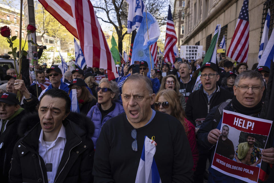 Pro-Israel demonstrators chant during the "Bring Them Home Now" rally outside the Columbia University , Friday, April 26, 2024, in New York. (AP Photo/Yuki Iwamura)