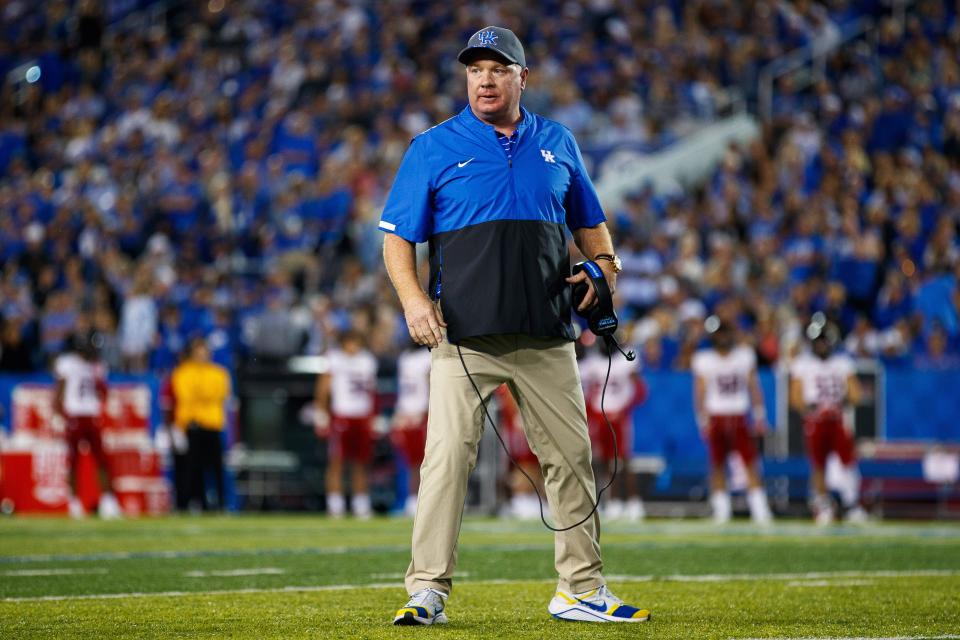 Sep 24, 2022; Lexington, Kentucky, USA; Kentucky Wildcats head coach Mark Stoops walks onto the field during a timeout in the second quarter against the Northern Illinois Huskies at Kroger Field. Mandatory Credit: Jordan Prather-USA TODAY Sports