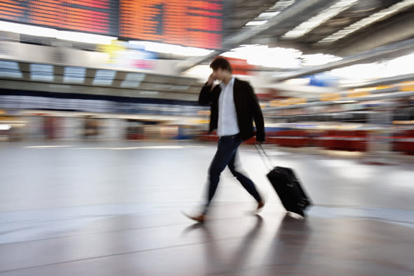 Mandatory Credit: Photo by Isifa Image Service/REX (927282a) YOUNG MAN HURRYING AT THE AIRPORT. Various  