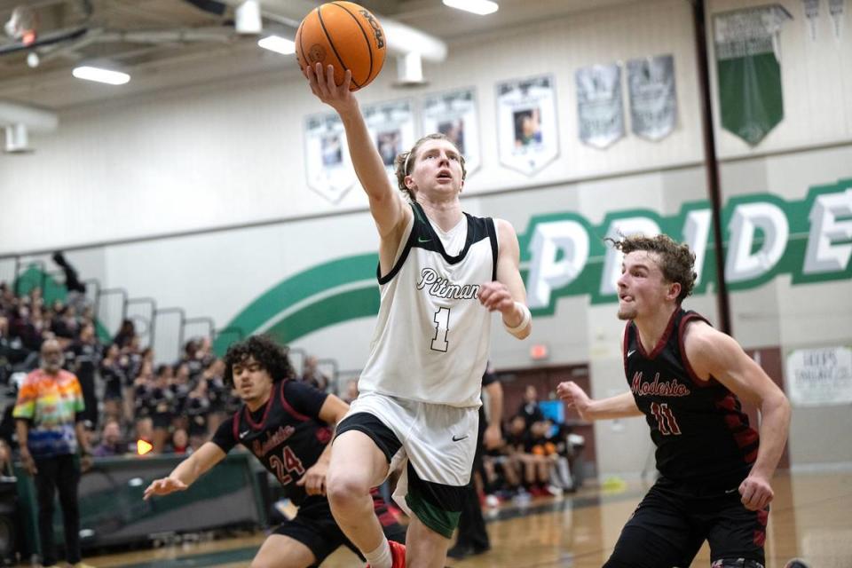 Pitman’s Avery Sanchez drives to the basket for a layup during the Central California Athletic League game with Modesto in Turlock, Calif., Friday, Jan. 26, 2024.