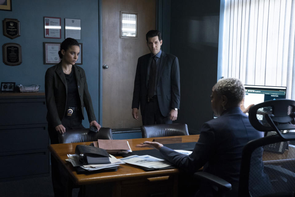 This image released by Peacock shows, from left, Juliana Canfield, Jeff Wilbusch and Karen Robinson in a scene from "The Calling." (Heidi Gutman/Peacock via AP)