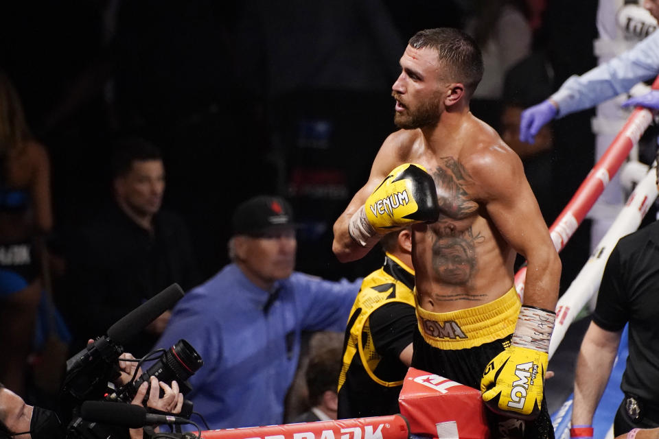 Vasiliy Lomachenko, of Ukraine, celebrates after defeating Masayoshi Nakatani, of Japan, by technical knockout during a lightweight bout Saturday, June 26, 2021, in Las Vegas. (AP Photo/John Locher)