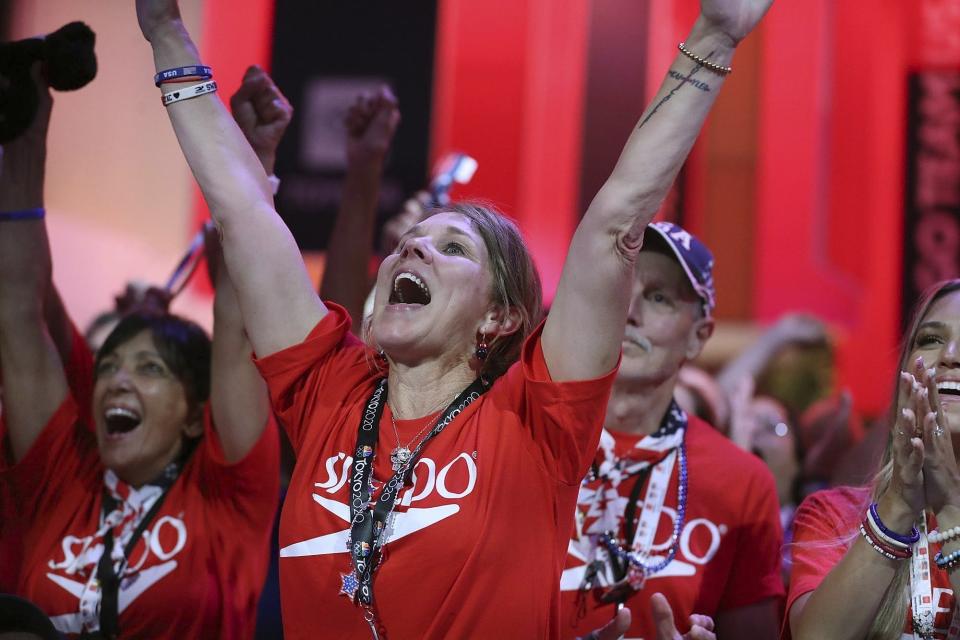 Christina Dressel, mother of Caeleb Dressel, reacts Friday, July 30, 2021, in Orlando, Fla., as Caeleb wins the gold in the men's swimming 100-meter butterfly at the Tokyo Olympics. (Stephen M. Dowell/Orlando Sentinel via AP)