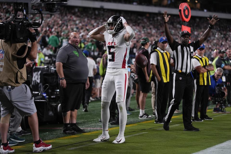 Atlanta Falcons wide receiver Drake London reacts to scoring a touchdown during the second half of an NFL football game against the Philadelphia Eagles on Monday, Sept. 16, 2024, in Philadelphia. (AP Photo/Matt Rourke)