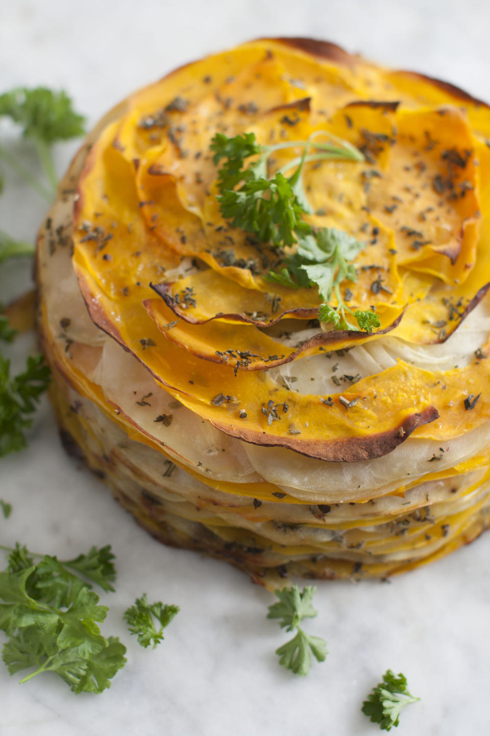 This March 31, 2014 photo shows roasted butternut and herb tart in Concord, N.H. (AP Photo/Matthew Mead)