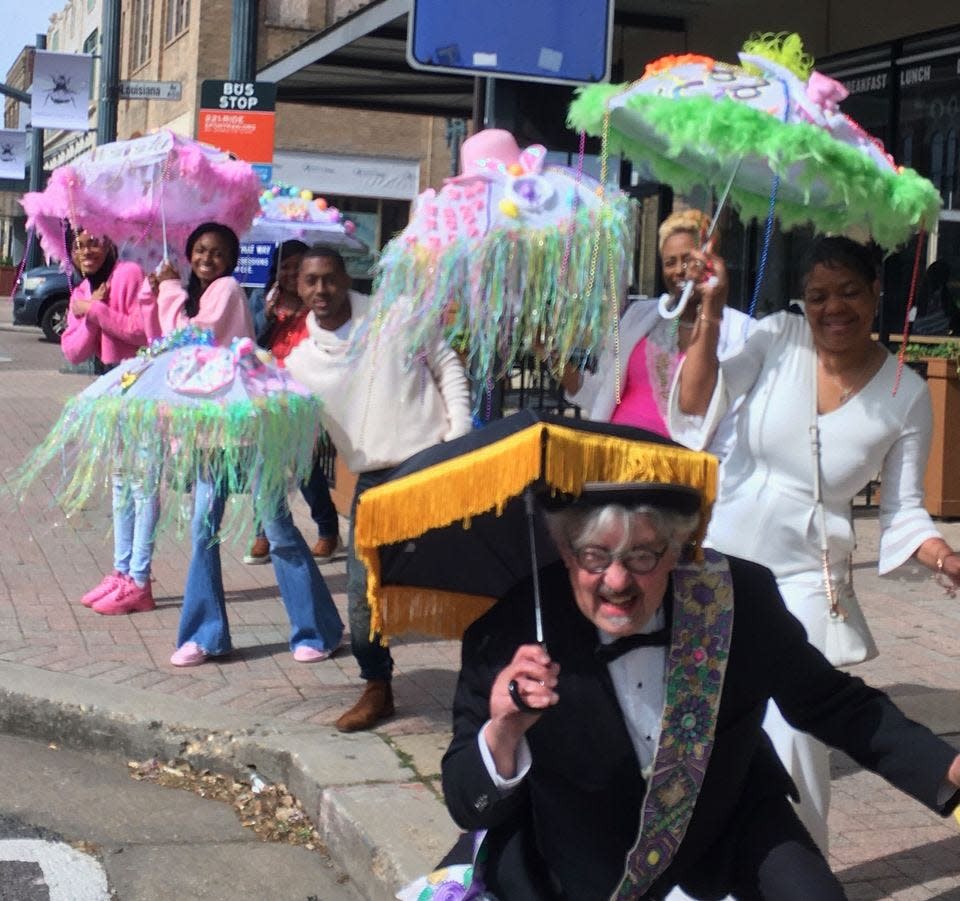 Darita Grigsby and Robert Trudeau invite you to come dance, walk and wave your umbrella as part of her Second Line Parade on Saturday.