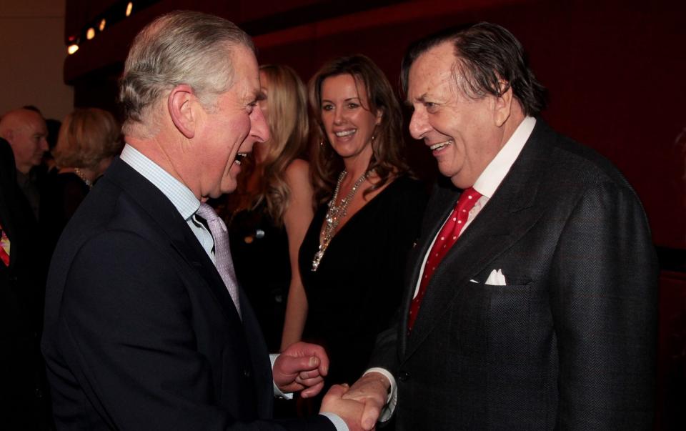 King Charles, then Prince of Wales, pictured meeting Barry Humphries backstage after The Prince's Trust Rock Gala in 2010