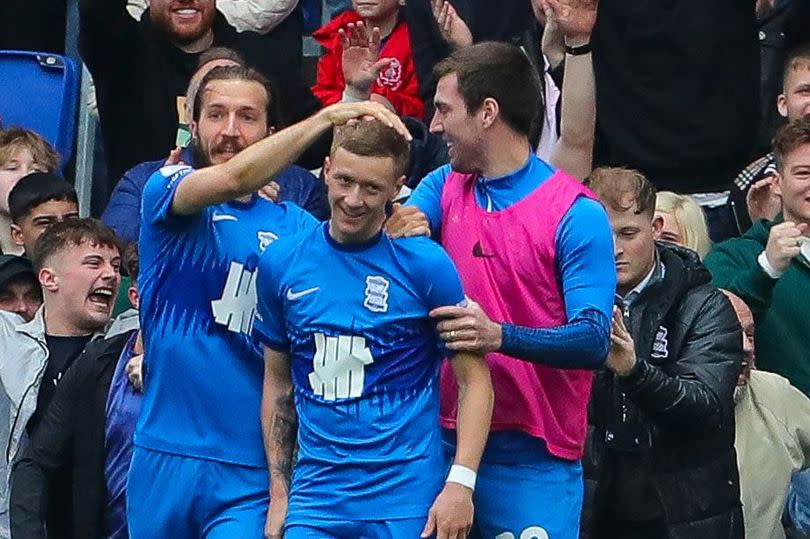 Birmingham City teammates celebrate with Jay Stansfield after his goal against Coventry City