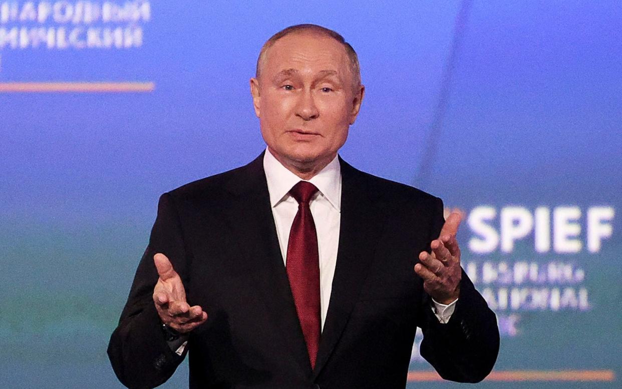 Putin claimed Russia's economy has overcome rocketing inflation following Western sanctions - AP