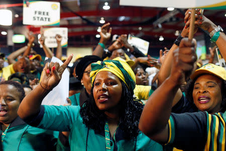 ANC members chant slogans at the 54th National Conference of the ruling African National Congress (ANC) at the Nasrec Expo Centre in Johannesburg, South Africa December 16, 2017. REUTERS/Siphiwe Sibeko