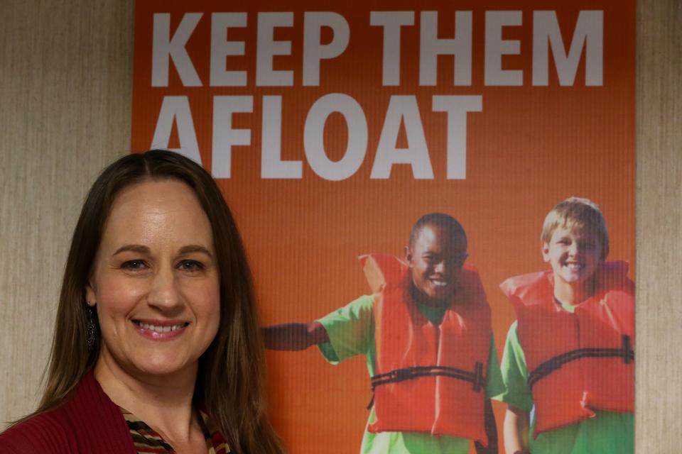 Becky Meyer, Youth Odyssey's executive director, poses inside the nonprofit Monday, Feb. 19, 2024.