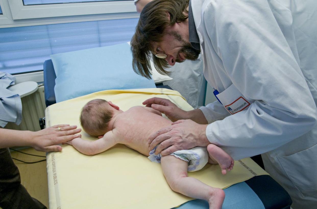 <span class="caption">A physician examines a 7-month-old infant with eczema. </span> <span class="attribution"><a class="link " href="https://www.gettyimages.com/detail/news-photo/photo-essay-at-the-department-of-dermatology-at-the-bocage-news-photo/151054958?adppopup=true" rel="nofollow noopener" target="_blank" data-ylk="slk:BSIP/UIG Via Getty Images;elm:context_link;itc:0;sec:content-canvas">BSIP/UIG Via Getty Images</a></span>