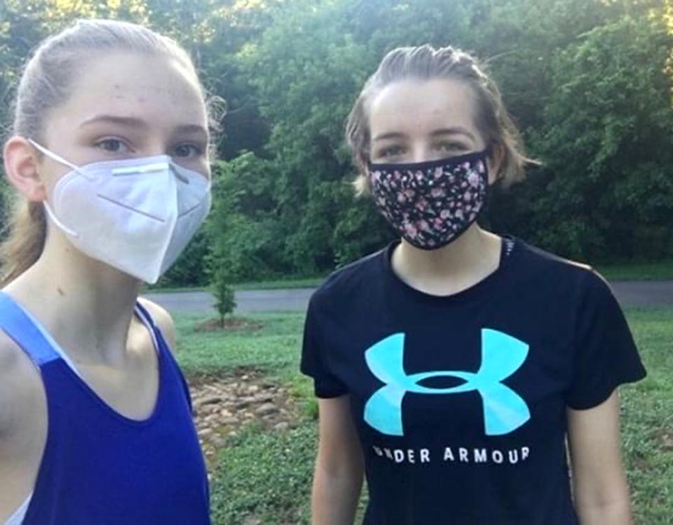 Two sisters competed in the #maskedmile challenge - and clocked in at a seven-minute mile. (Courtesy Kayla Burrell)