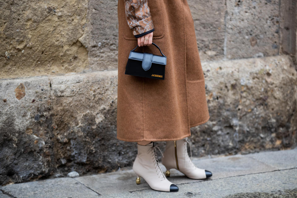 MILAN, ITALY - SEPTEMBER 24: A guest is seen wearing Jacquemus bag, brown outside Max Mara during the Milan Women's Fashion Week on September 24, 2020 in Milan, Italy. (Photo by Christian Vierig/Getty Images)