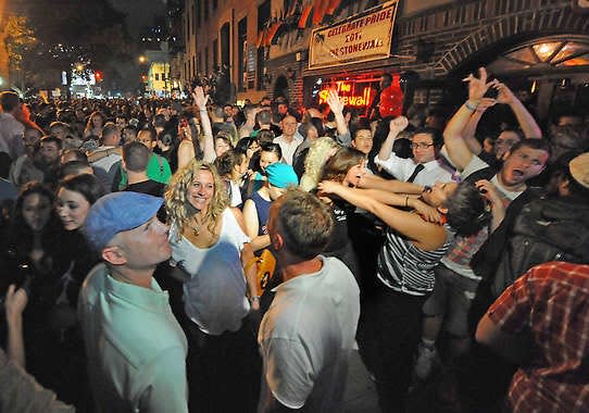 Revelers celebrate in front of the Stonewall Inn in Manhattan''s west village in 2015, following the passing of the same sex marriage bill by a vote of 33 to 29. Louis Lanzano | Associated Press