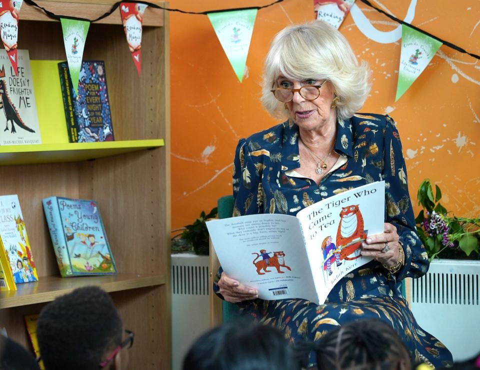 <p>Camilla, Duchess of Cornwall reads to children during her visit to Griffin Primary School to open the new Life-changing Library on June 22 in London.</p>