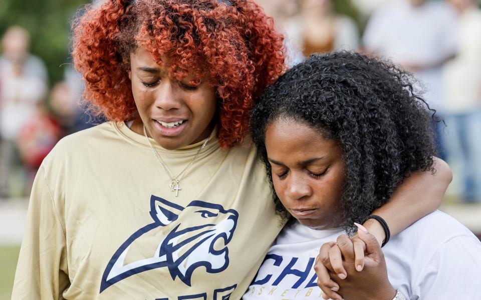 Emotions ran high as people attended a vigil for the victims