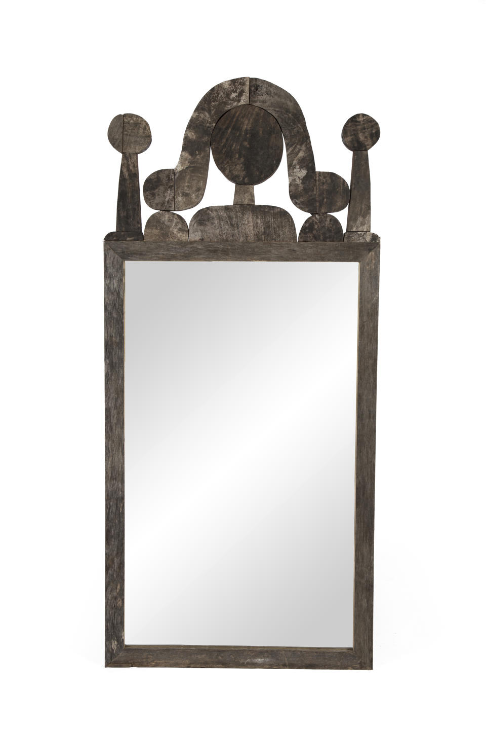 This photo shows an Indi mirror Sawkille Co.'s Jonah Meyer designed which uses reclaimed silver maple wood. (Sawkille Co. via AP)