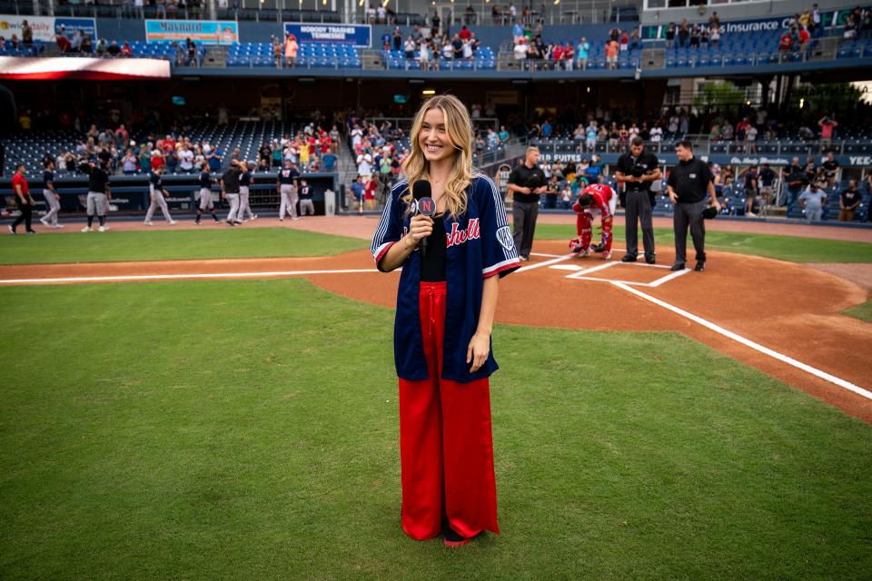 Harper Grace smiles after singing the national anthem before a Nashville Sounds game at First Horizon Park in Nashville, Tenn., Friday, July 21, 2023.