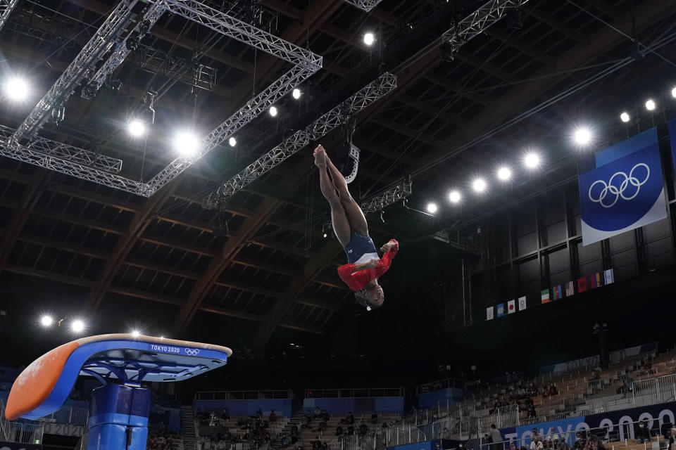 FILE - Simone Biles, of the United States, performs on the vault during the artistic gymnastics women's final at the 2020 Summer Olympics, July 27, 2021, in Tokyo. USA Gymnastics announced Wednesday, June 28, 2023, that Biles, the 2016 Olympic champion, will be part of the field at the U.S. Classic outside of Chicago on Aug. 5. The meet will be Biles' first since the 2020 Olympics. (AP Photo/Ashley Landis, File)