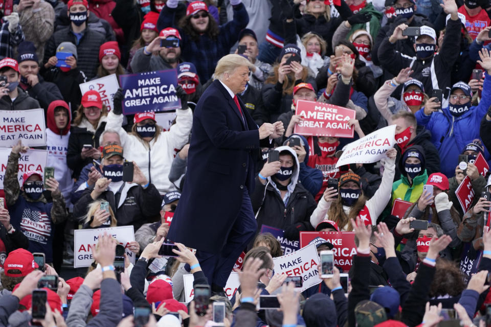 President Donald Trump arrives at a campaign rally, Saturday, Oct. 17, 2020, in Norton Shores, Mich. (AP Photo/Carlos Osorio)