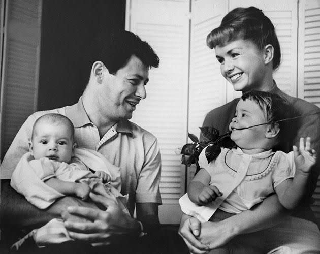 Eddie and Debbie with baby Carrie and her brother Todd in 1958. Source: Getty