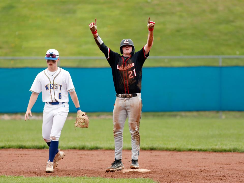 Calan Shaw celebrates after hitting a double during Coshocton's 4-1 loss to West Muskingum on Wednesday in Falls Township.