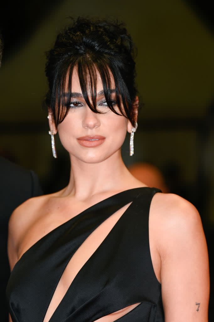 Dua Lipa with a sweepy fringe 