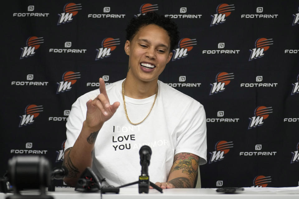 Phoenix Mercury center Brittney Griner smiles as she answers questions during a press conference following the team's WNBA basketball game against the Dallas Wings, Wednesday, June 7, 2023, in Arlington, Texas.  (AP Photo/Tony Gutierrez)