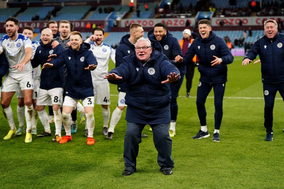 Steve Evans celebrated the victory over Villa (PA) (PA Wire)
