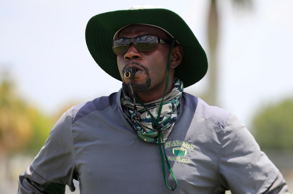 Head coach Elgin Hicks along with assistant coaches conducted different drills and fitness routines during Island Coast High School's second spring football practice Tuesday, April 27, 2021. 