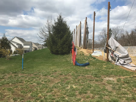 Pipeline construction takes place alongside a row of houses in a neighborhood outside of Philadelphia, Pennsylvania April 5, 2018. REUTERS/Stephanie Kelly/Files