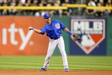 Oct 7, 2015; Pittsburgh, PA, USA; Chicago Cubs second baseman Starlin Castro (13) throws to first base against the Pittsburgh Pirates during the first inning in the National League Wild Card playoff baseball game at PNC Park. Charles LeClaire-USA TODAY Sports