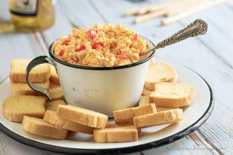 <p>Biscuits and Burlap</p><p>Homemade pimento cheese with a smoky twist and a spicy kick is perfect for snacks and sandwiches on its own. Use it in any recipe that calls for pimento cheese as an ingredient, and take your dish up a notch or two.</p><p><strong>Get the Recipe: </strong><a href="https://www.biscuitsandburlap.com/spicy-and-smoky-pimento-cheese/" rel="nofollow noopener" target="_blank" data-ylk="slk:Smoky Pimento Cheese;elm:context_link;itc:0;sec:content-canvas" class="link ">Smoky Pimento Cheese</a></p>