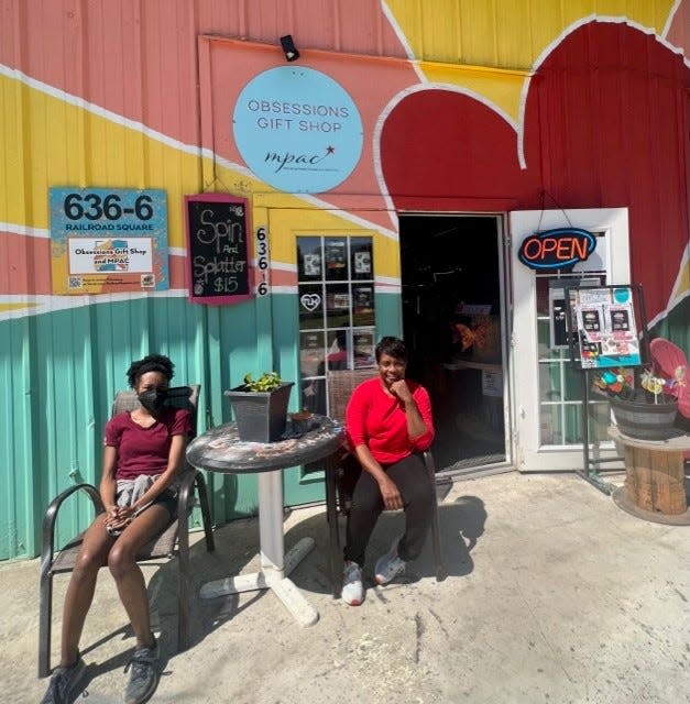 Betty Proctor, with her daughter, Nijah, owns Obsessions Gift Shop in Railroad Square Art District. The shop opened in 2017 to give other artists and vendors a space to try their craft.