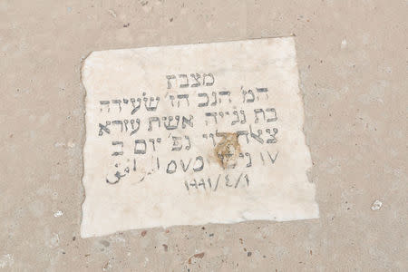 Jewish writings, on a tomb, are seen at a Jewish cemetery in the Sadr City district of Baghdad, Iraq March 29, 2018. Picture taken March 29, 2018. REUTERS/Wissm Al-Okili