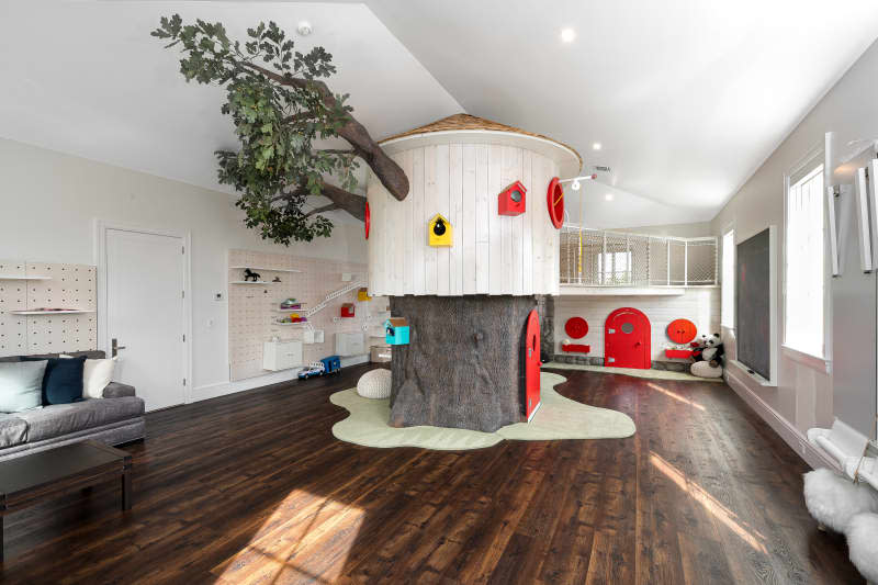 Faux tree house in child's playroom.