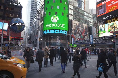 The Xbox One logo is pictured on the NASDAQ building in Times Square in New York, November 21, 2013. REUTERS/Carlo Allegri
