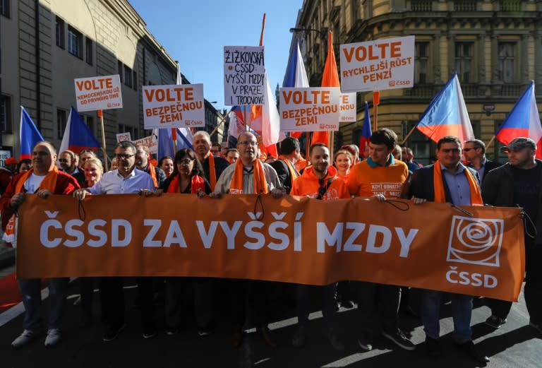 Czech Foreign Minister Lubomir Zaoralek and top candidate of the Czech Social Democratic Party (CSSD) along Czech Prime Minister Bohuslav Sobotka (C) attend an election rally in Prague on October 15, 2017