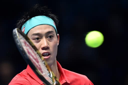 Kei Nishikori in action against Roger Federer at the ATP Finals