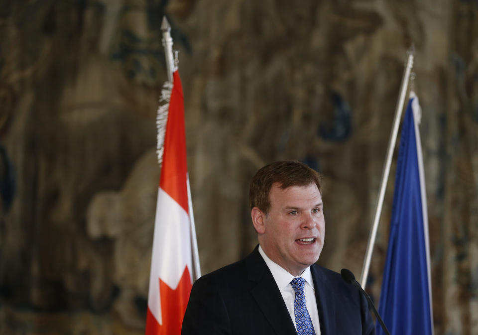 Canadian Foreign Affairs Minister John Baird answers questions to media during a press conference in Prague, Czech Republic, Tuesday, April 22, 2014. (AP Photo/Petr David Josek)