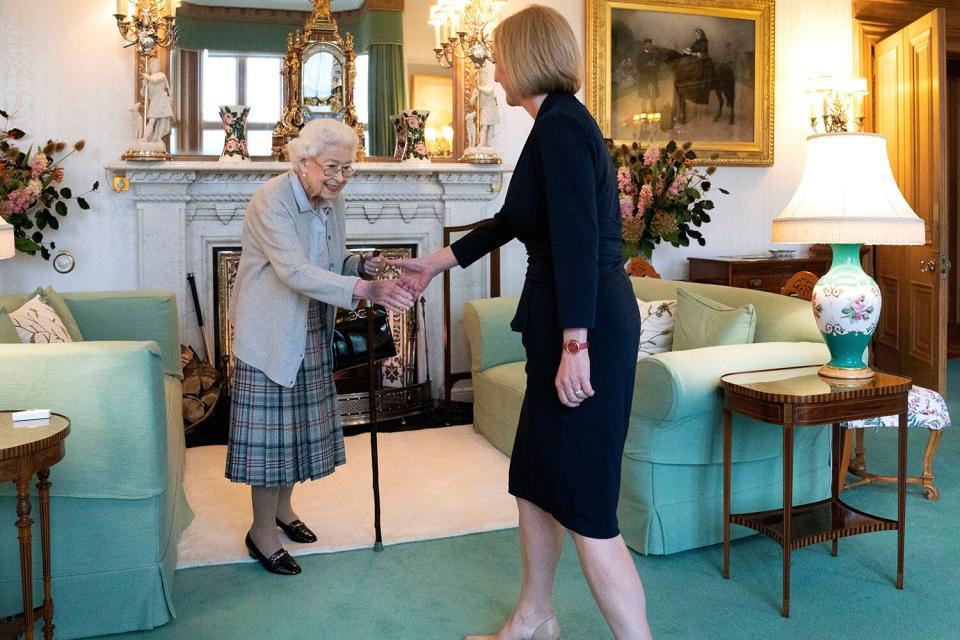 Queen Elizabeth II, left, welcomes Liz Truss during an audience at Balmoral, Scotland