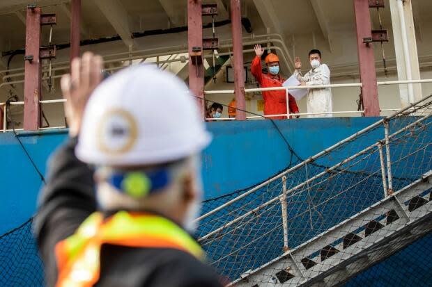 Athaide waves to seafarers onboard bulk carriers in B.C.