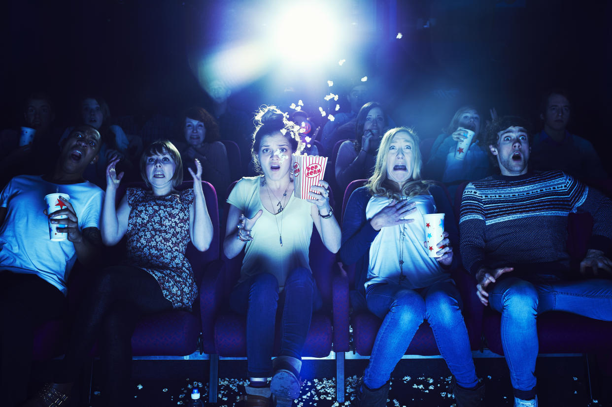 Audience enjoying movie at the cinema