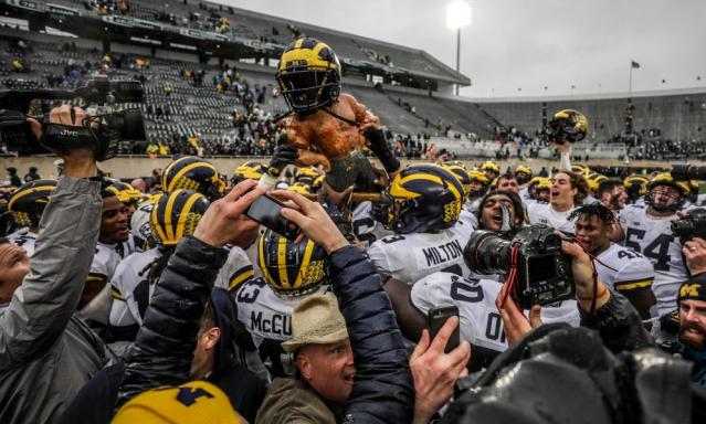 Michigan football donning all-blue uniforms against Washington