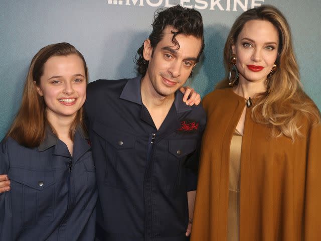 <p>Bruce Glikas/Getty</p> Vivienne Jolie-Pitt, Justin Levine and Angelina Jolie attend the opening night of "The Outsiders" on April 11, 2024 in New York City.