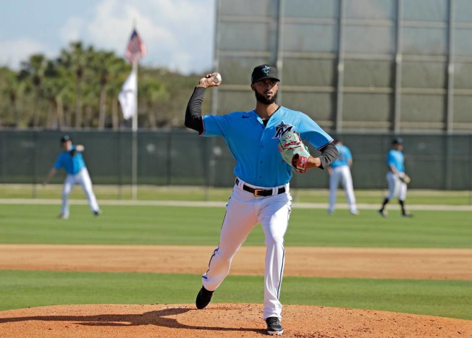 Miami Marlins pitcher Sandy Alcantara (22) pitches during the first full-squad spring training workout at Roger Dean Stadium on Monday, February 17, 2020 in Jupiter, FL.