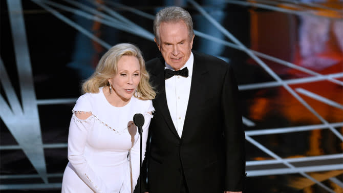 Faye Dunaway, left, and Warren Beatty present the award for best picture at the Oscars on Sunday, Feb. 26, 2017, at the Dolby Theatre in Los Angeles. (Photo by Chris Pizzello/Invision/AP)